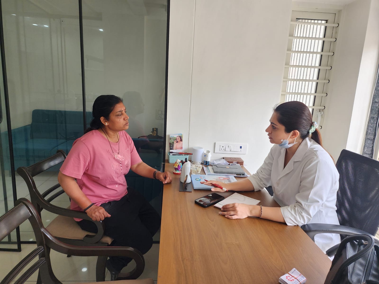Doctor consulting with patient